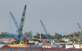Vietnam construction projects face rising costs as barges crowd Mekong River for Cambodian sand