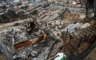 Chile wildfires kill 19 amid extreme heat; scores evacuated