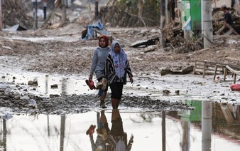 Indonesia revokes 28 firms' permits, says violations worsened flood impact