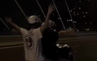 Police impound scooter after teen rides it hands-free on Ho Chi Minh City bridge