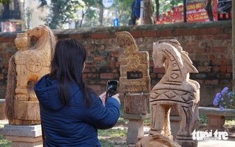 Vietnam folk wood sculptures showcased at Hanoi heritage site