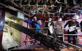 TEPCO unveils new robot arm for nuclear debris removal
