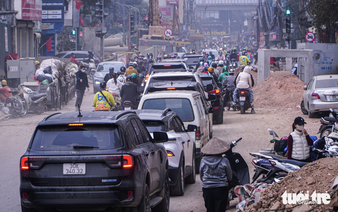 Hanoi residents cry foul as street expansion drags on, stirring dust, disruption ahead of Tet