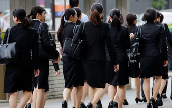 Japan intensifies fight against workplace harassment