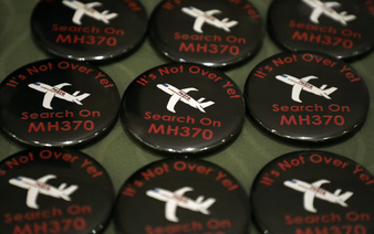 Families of flight MH370 passengers urge Malaysia to extend search