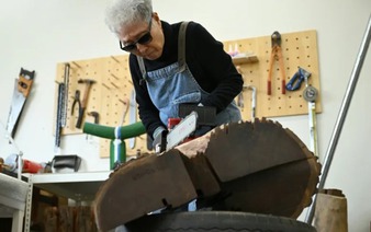 South Korea's chainsaw artist carves a name for herself at 91