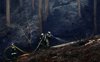Firefighters in northern Japan struggle to contain blazes as over 3,000 people evacuated