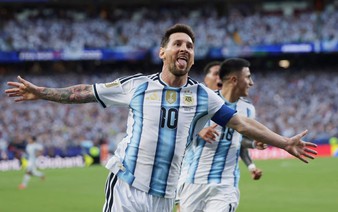 Messi hat-trick equals scoring record as Argentina dazzle against Algeria