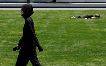 Keeping cool, Tokyo style: Shorts, sneakers and no ties