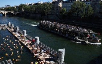 Splish-splash! Parisians and tourists soak in the Seine