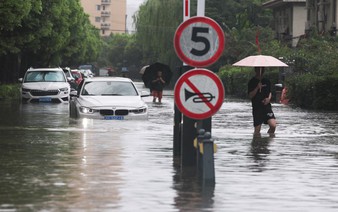 Storms from Dolphin soak China's east, ground nearly 950 Shanghai flights
