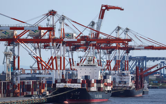 Japan's exports surge on chips demand, imports hit record on oil costs