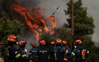 Two die as firefighting helicopters collide in Greece, French blaze changes course