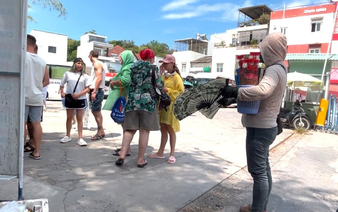 Street vendors hassle foreign tourists visiting Nha Trang pagoda