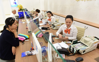 In Vietnam, banks offer gold, villas in race for deposits