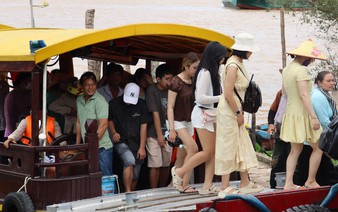 Duck massages, popped rice lure crowds to Can Tho’s Son Islet in Vietnam’s Mekong Delta