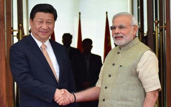 China's Xi makes maiden India visit, seeking to reset ties