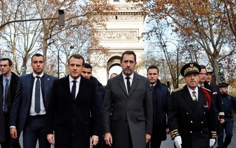 Macron tells PM to hold talks after worst unrest in Paris for decades