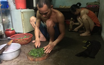 Saigon’s riverside residents make ends meet selling scrap