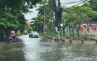 Prolonged downpours triggered by Storm Ma-on flood streets, houses in northern Vietnam