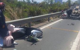 Porsche overturns after sweeping through motorbikes near Ho Chi Minh City expressway
