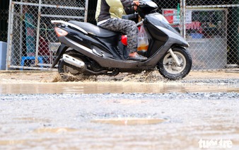 Poor road conditions make life tougher for students in suburban Ho Chi Minh City