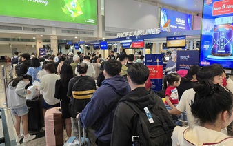 Long lines at Tan Son Nhat airport as Tet travel kicks off