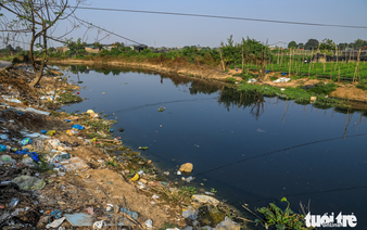 Hanoi’s ancient boat festival faces threat from river pollution