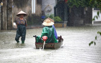 Floods force evacuation of thousands in northern Vietnam, while landslide kills 3 family members 