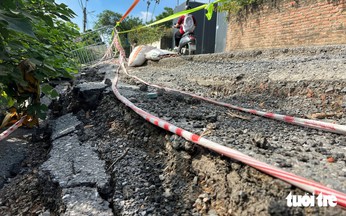 Danger lurks along severely deteriorated roads in central Hanoi