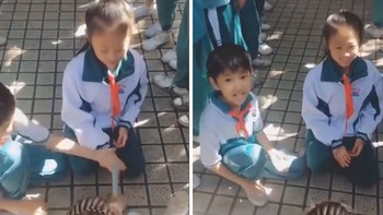 Cậu bé ga lăng đỡ phạt cho bạn gái