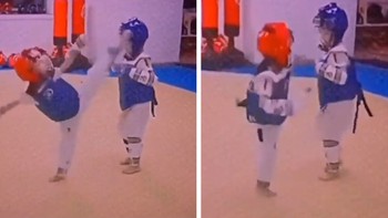 Dù đang thi đấu võ, bé trai cương quyết không đánh trả bé gái