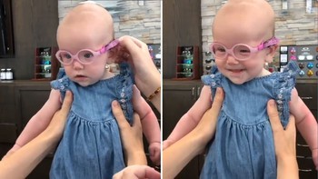 Phản ứng đáng yêu của bé gái lần đầu tiên thấy bố mẹ