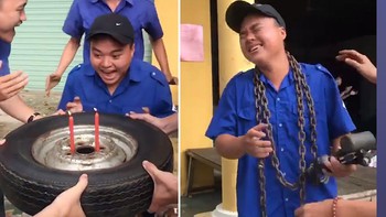 Chàng trai được nhóm bạn lấy lốp ôtô làm bánh gato cho thổi nến