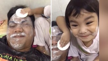 Bố nằm chịu trận cho con gái đánh phấn trang điểm