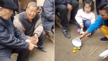 Các cụ ông trầm trồ trước màn ảo thuật hô biến 3 quả cam vào 1 bát
