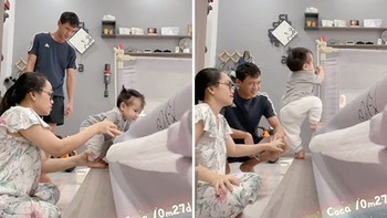 Bố mẹ tận tình chỉ dẫn con gái nhỏ leo xuống giường an toàn