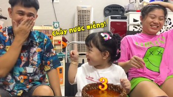 Phản ứng bá đạo của con gái khi được bố mẹ hun chúc mừng sinh nhật