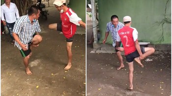 2 người đàn ông chơi đá cuội rộn ràng cả xóm