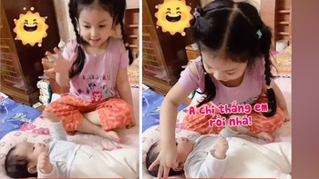 Bé trai bị chị búng tai hoài khi chơi oẳn tù tì