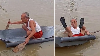 Cụ ông ngã chổng vó khi chèo thuyền tự chế