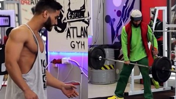 Chàng trai tập gym ngơ ngác khi thấy anh lao công một tay xách tạ