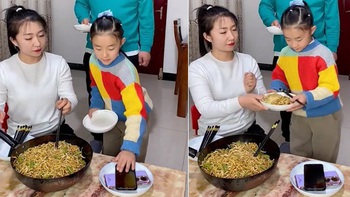 Bố con giao nộp điện thoại cho mẹ khi ăn cơm