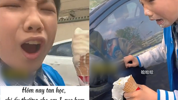 Bé trai nhận trái đắng vì mải mê khoe cây kem chị mới mua cho