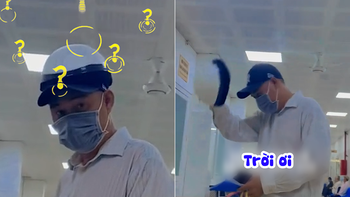 Người đàn ông cởi nón bảo hiểm nhưng ruột vẫn dính trên đầu