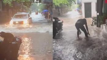 Ô tô hóa tàu ngầm đánh sóng tràn vào nhà hất ngã nam thanh niên
