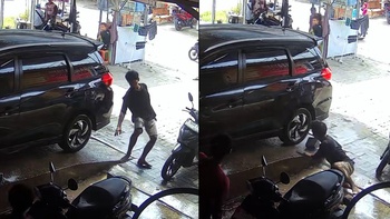 Chàng trai nhanh trí khi thấy ô tô đang rửa bị trôi bánh