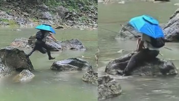 Cần thủ không nói nên lời khi trượt chân trên tảng đá