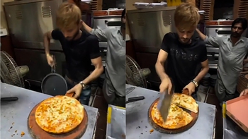 Chàng trai tay nhanh hơn não khi cắt bánh pizza