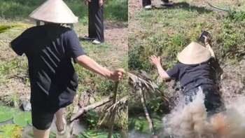 Cô gái vồ ếch khi nhảy qua mương nước